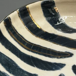 Explores movement beneath stillness — flowing black markings like tides or repeating emotional patterns. (view 4 of 4)