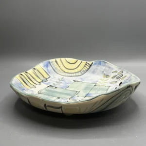 Shoreline Fragments reflects the quiet act of gathering meaning from the coast — shells, tide patterns, sea grasses, shifting light, and remembered landscapes.