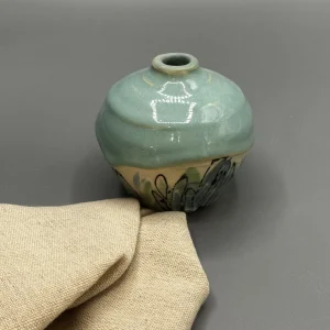 A quiet bottle form shaped around softness, rhythm, and containment. (view 4 of 4)